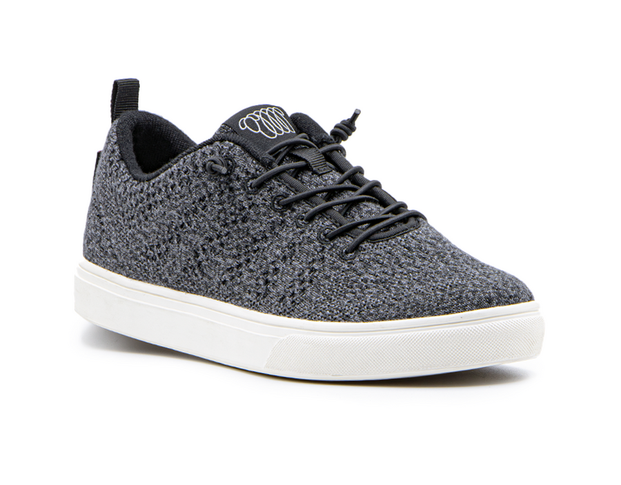 black merino wool belmont with breathable fabric, white sole, and back pull tab for easy wear.