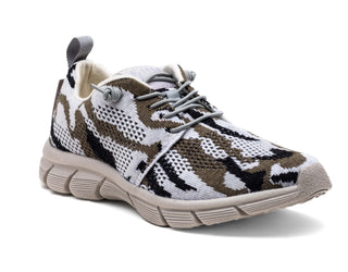 sand merino wool fraser shoe three-quarter angle breathable fabric, white sole, and back pull tab for easy wear
