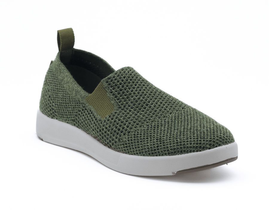 green suffolk shoe three-quarter angle breathable fabric, white sole, and back pull tab for easy wear